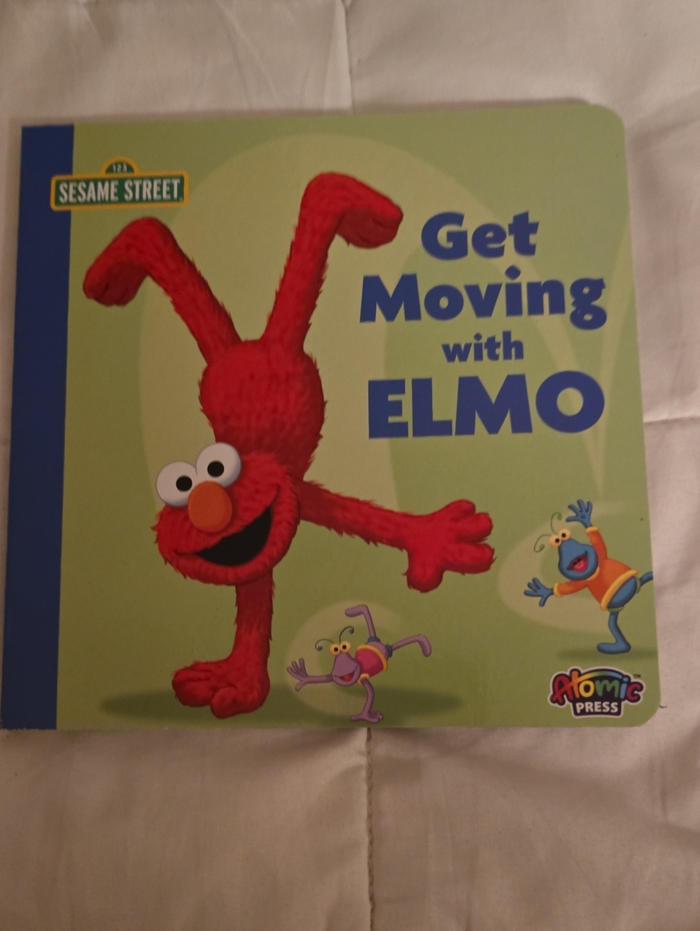Sesame Street Elmo Board Book - Red, Blue, Green